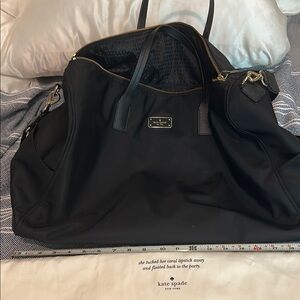 Kate Spade Black duffle bagwith Sleek Design